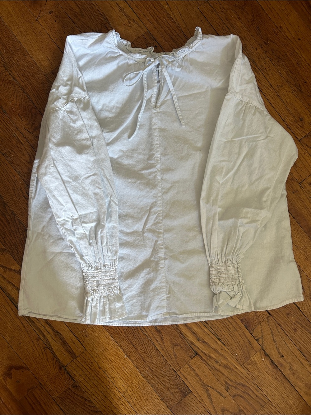 Women’s White Tie-Neck Peasant Blouse with Smocked Cuffs